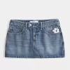 Laag uitgesneden geborduurde denim minirok Laag uitgesneden geborduurde denim minirok