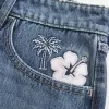 Laag uitgesneden geborduurde denim minirok Laag uitgesneden geborduurde denim minirok