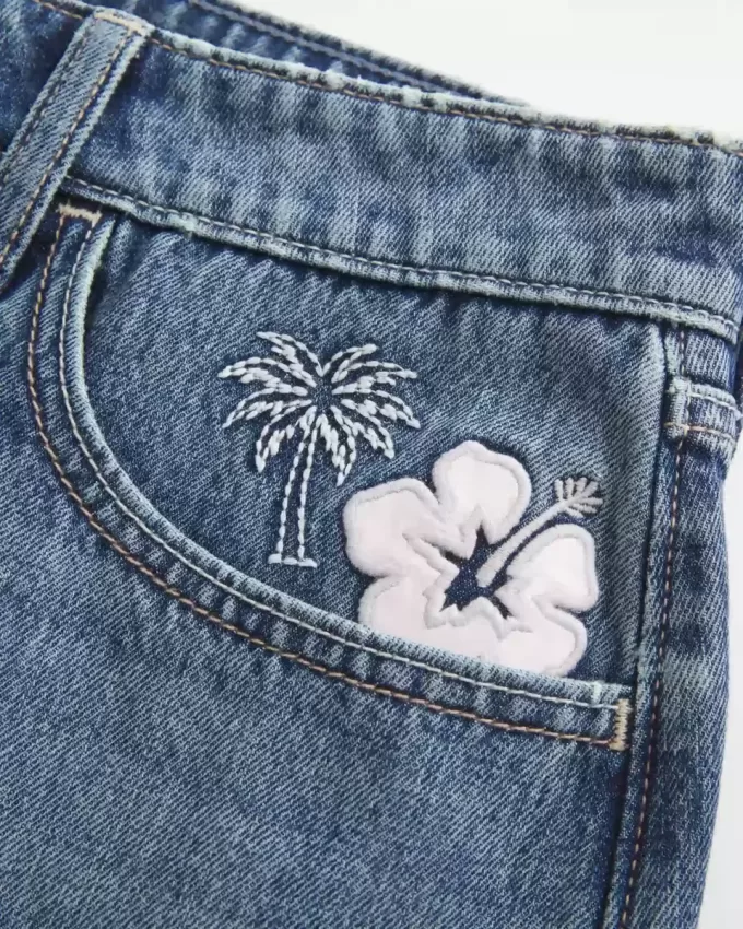 Laag uitgesneden geborduurde denim minirok Laag uitgesneden geborduurde denim minirok