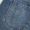 Laag uitgesneden geborduurde denim minirok Laag uitgesneden geborduurde denim minirok