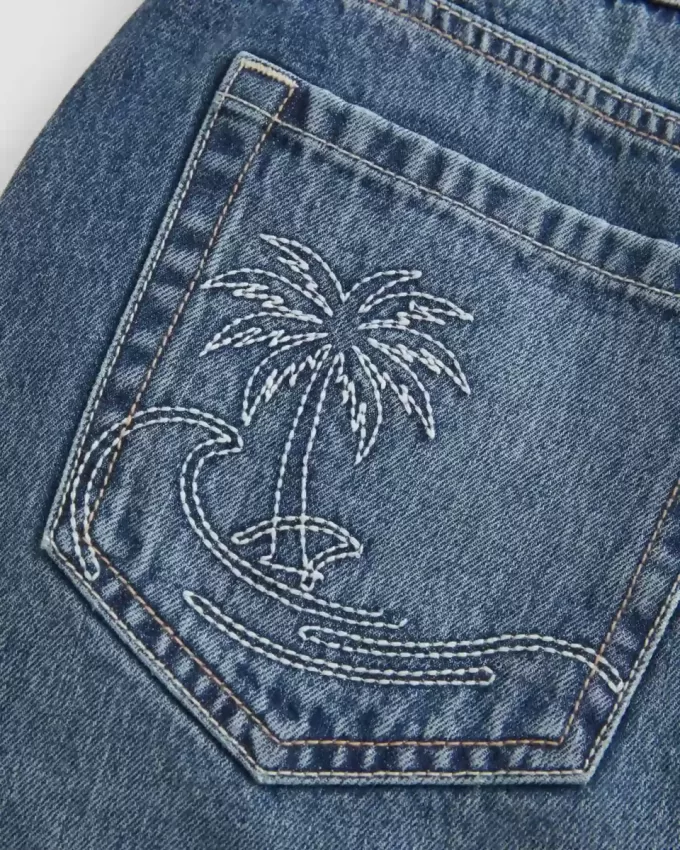 Laag uitgesneden geborduurde denim minirok Laag uitgesneden geborduurde denim minirok