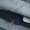Laag uitgesneden geborduurde denim minirok Laag uitgesneden geborduurde denim minirok