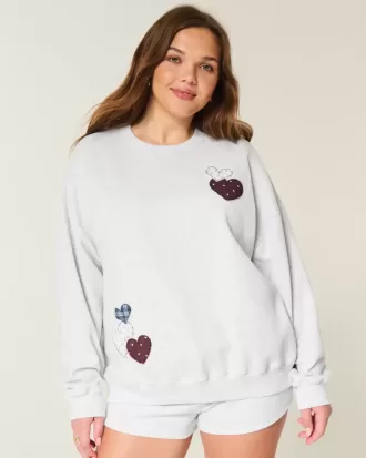 Oversized sweatshirt met hartvormige grafische print Oversized sweatshirt met hartvormige grafische print