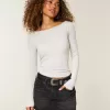 Top met lange mouwen en schuine hals Top met lange mouwen en schuine hals